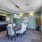 Miami apartment community with conference room with a table, chairs and tv