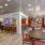 pub with a bar, tables and chairs at our apartments in Miami.